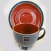 Denby Harlequin Cup & Saucer Green OUT /Red IN