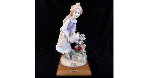 lady-watering-plants-by-